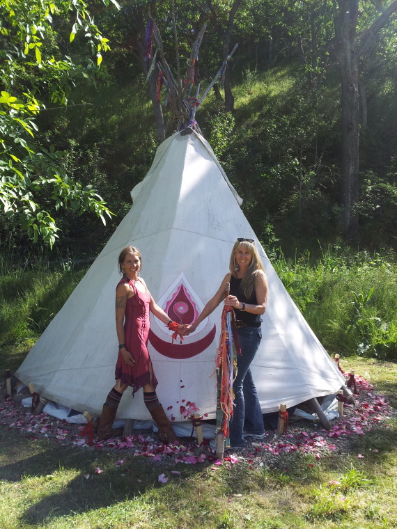 Finished! Graell - co-founder of the Goddess Temple and Suz, Wisdom Keeper of the Moon Lodge 2014. This tipi belongs to Graell and her daughter.